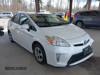 2015 Toyota Prius Four z VIN JTDKN3DU9F1927171, wystawiony jako IAAI lot #41819127 z przebiegiem 109 442 mil mil oraz . Historia ofert i sprzedaży dostępna na DreamBid. Obrazek 1.