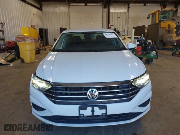 2021 Volkswagen Jetta S z VIN 3VWC57BU5MM046236, wystawiony jako IAAI lot #41740297 z przebiegiem 57 769 mil mil oraz . Historia ofert i sprzedaży dostępna na DreamBid. Obrazek 13.