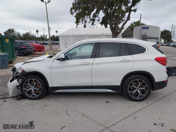 2018 BMW X1 xDrive28i with VIN WBXHT3C37J3H33461, listed as a IAAI auction lot 40997589 with 1 mi miles. Bid and sale history available at carsss.com. Image 15.