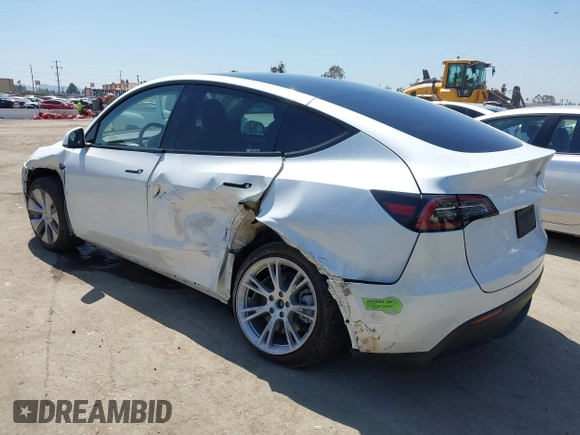 2023 Tesla Model Y Long Range z VIN 7SAYGDEE5PA104635, wystawiony jako IAAI lot #41989014 z przebiegiem 15 347 mil mil oraz . Historia ofert i sprzedaży dostępna na DreamBid. Obrazek 3.