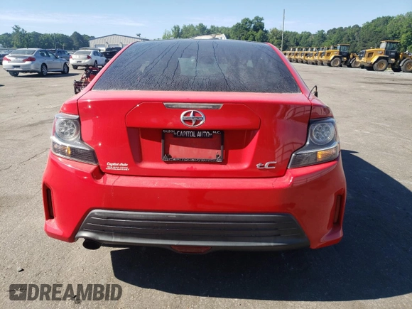 2015 Scion tC z VIN JTKJF5C78F3091348, wystawiony jako Copart lot #54659525 z przebiegiem 229 840 mil mil oraz Szkoda całkowita • Salvage title. Historia ofert i sprzedaży dostępna na DreamBid. Obrazek 6.
