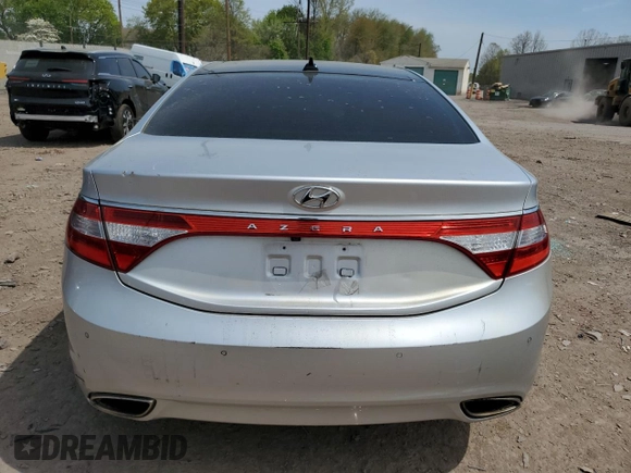 2012 Hyundai Azera z VIN KMHFH4JGXCA173752, wystawiony jako Copart lot #54708955 z przebiegiem 177 711 mil mil oraz Czysty tytuł • Clean title. Historia ofert i sprzedaży dostępna na DreamBid. Obrazek 6.