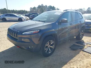 2014 Jeep Cherokee Trailhawk with VIN 1C4PJMBS6EW278987, listed as a IAAI auction lot 41789868 with 136,696 mi miles. Bid and sale history available at carsss.com. Image 18.