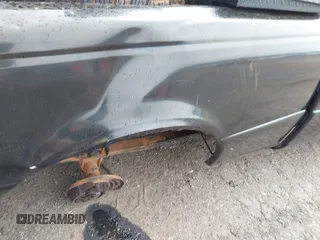 2000 Ford Ranger XL z VIN 1FTYR14C8YTA87370, wystawiony jako IAAI lot #42071213 z przebiegiem Nie podano mil oraz . Historia ofert i sprzedaży dostępna na DreamBid. Obrazek 14.