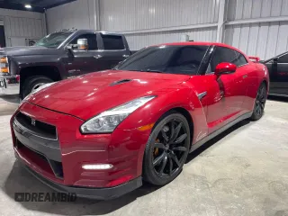 2015 Nissan GT-R Premium z VIN JN1AR5EF2FM281470, wystawiony jako Copart lot #82454854 z przebiegiem 60 081 mil mil oraz Czysty tytuł • Clean title. Historia ofert i sprzedaży dostępna na DreamBid. Obrazek 2.