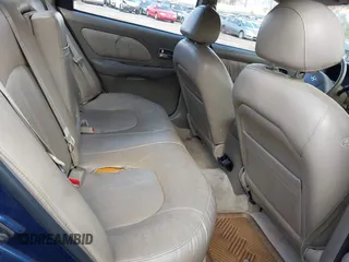 2004 Hyundai Sonata GLS with VIN KMHWF35H34A082570, listed as a IAAI auction lot 41930653 with 99,490 mi miles. Bid and sale history available at carsss.com. Image 8.