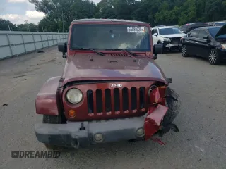 2007 Jeep Wrangler Sahara с VIN 1J4FA54137L205242, выставлен на аукционе Copart как лот 65080025 с пробегом 128 682 миль миль и Списание • Salvage title. История ставок и продаж доступна на DreamBid. Изображение 5.