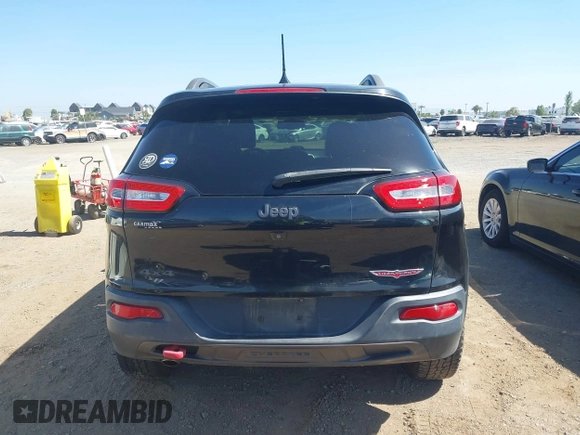 2016 Jeep Cherokee Trailhawk with VIN 1C4PJMBB9GW179051, listed as a IAAI auction lot 42520342 with 100,538 mi miles and . Bid and sale history available at DreamBid. Image 16.