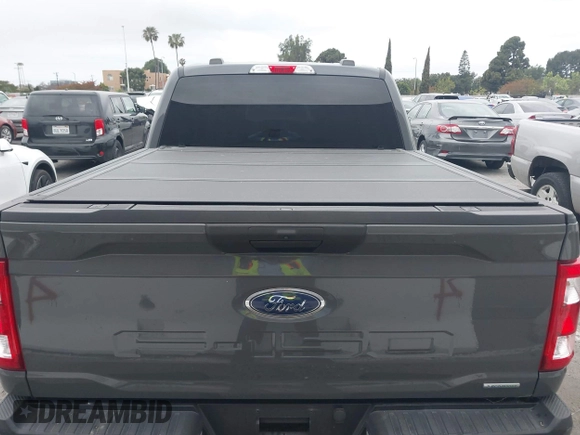 2021 Ford F-150 XL z VIN 1FTEW1CP1MKD41646, wystawiony jako IAAI lot #42174841 z przebiegiem 52 968 mil mil oraz . Historia ofert i sprzedaży dostępna na DreamBid. Obrazek 16.