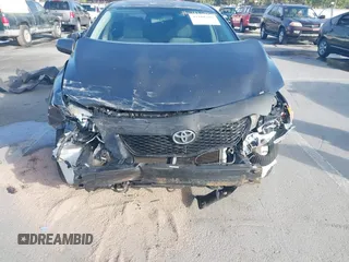 2009 Toyota Corolla with VIN 1NXBU40E29Z143324, listed as a IAAI auction lot 42101208 with 237,763 mi miles. Bid and sale history available at carsss.com. Image 6.