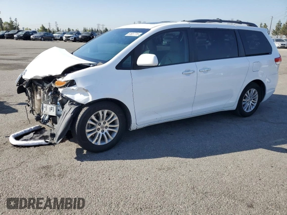2013 Toyota Sienna XLE AAS with VIN 5TDYK3DC5DS322039, listed as a Copart auction lot 61657715 with 185,269 mi miles and Salvage title. Bid and sale history available at DreamBid. Image 1.