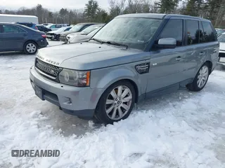 2013 Land Rover Range Rover Sport HSE LUX with VIN SALSK2D49DA781170, listed as a IAAI auction lot 41590352 with 133,560 mi miles. Bid and sale history available at carsss.com. Image 2.