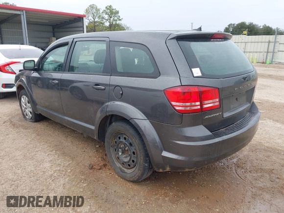 2014 Dodge Journey American Value Pkg with VIN 3C4PDCAB7ET247286, listed as a IAAI auction lot 41214056 with 205,222 mi miles. Bid and sale history available at carsss.com. Image 3.
