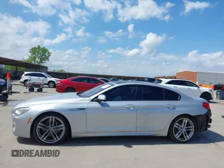 2015 BMW 6 Series 650i z VIN WBA6B2C55FGB99196, wystawiony jako IAAI lot #42107698 z przebiegiem 74 393 mil mil oraz . Historia ofert i sprzedaży dostępna na DreamBid. Obrazek 15.