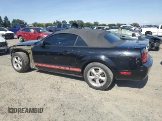 2008 Ford Mustang Deluxe with VIN 1ZVHT84N385113015, listed as a Copart auction lot 56558495 with 120,085 mi miles and Salvage title. Bid and sale history available at DreamBid. Image 2.