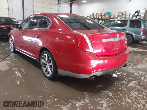 2009 Lincoln MKS with VIN 1LNHM94R59G610559, listed as a IAAI auction lot 41704552 with 168,556 mi miles. Bid and sale history available at carsss.com. Image 3.