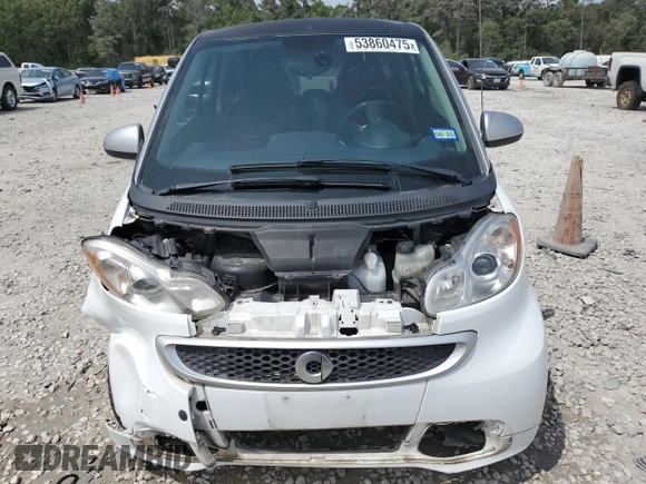 2015 Smart fortwo Passion с VIN WMEEJ3BA6FK807938, выставлен на аукционе Copart как лот 53860475 с пробегом 77 748 миль миль и Списание • Salvage title. История ставок и продаж доступна на DreamBid. Изображение 5.