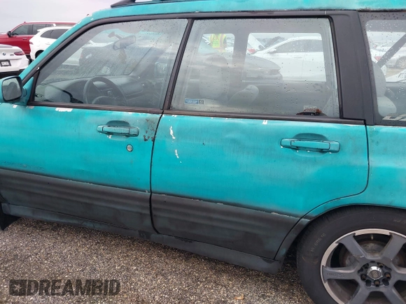 2001 Subaru Forester L with VIN JF1SF63551H762136, listed as a IAAI auction lot 40521706 with 0 mi miles. Bid and sale history available at carsss.com. Image 6.