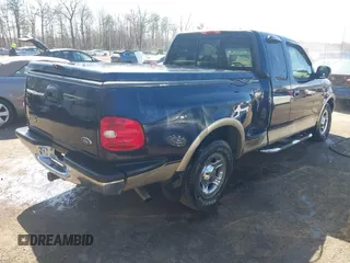 1999 Ford F-150 XL with VIN 2FTRX07L3XCA60067, listed as a IAAI auction lot 41887212 with 176,034 mi miles. Bid and sale history available at carsss.com. Image 4.
