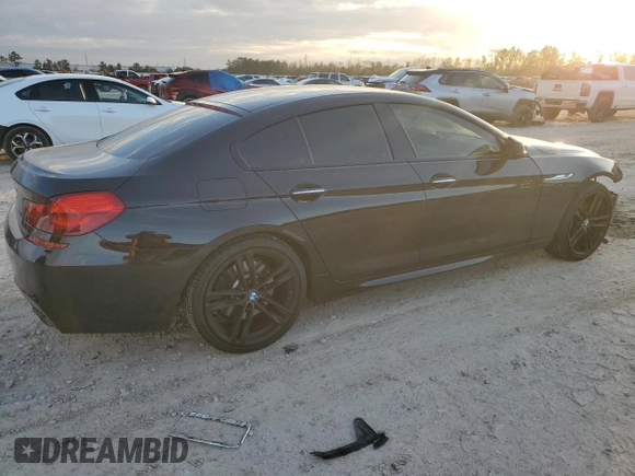 2014 BMW 6 Series 650i z VIN WBA6B2C53ED129256, wystawiony jako Copart lot #85346084 z przebiegiem 51 948 mil mil oraz Szkoda całkowita • Salvage title. Historia ofert i sprzedaży dostępna na DreamBid. Obrazek 3.