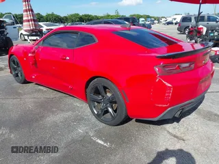 2018 Chevrolet Camaro 1LT with VIN 1G1FB1RX4J0115866, listed as a IAAI auction lot 41153245 with 71,582 mi miles. Bid and sale history available at carsss.com. Image 3.