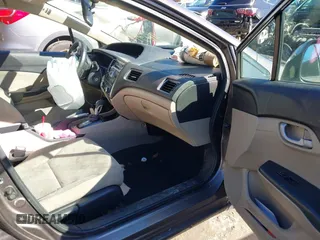 2013 Honda Civic LX with VIN 2HGFB2F59DH598885, listed as a IAAI auction lot 41734451 with 124,453 mi miles and . Bid and sale history available at DreamBid. Image 5.