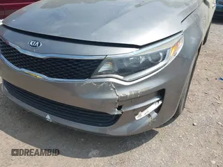 2016 Kia Optima LX z VIN 5XXGT4L34GG097375, wystawiony jako IAAI lot #42401993 z przebiegiem 145 389 mil mil oraz . Historia ofert i sprzedaży dostępna na DreamBid. Obrazek 6.
