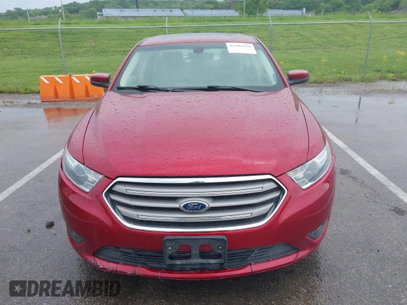 2014 Ford Taurus SEL z VIN 1FAHP2E83EG125622, wystawiony jako IAAI lot #42204238 z przebiegiem 134 032 mil mil oraz . Historia ofert i sprzedaży dostępna na DreamBid. Obrazek 13.