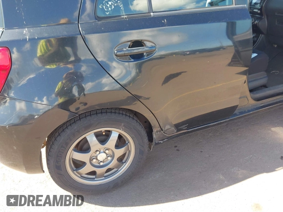 2008 Scion xD with VIN JTKKU10498J006447, listed as a IAAI auction lot 41883311 with 116,444 mi miles. Bid and sale history available at carsss.com. Image 6.