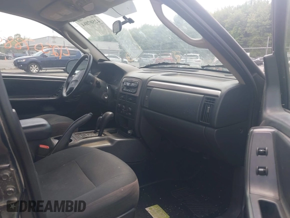 2003 Jeep Grand Cherokee Laredo with VIN 1J4GW48S03C557756, listed as a IAAI auction lot 42507884 with 195,236 mi miles and . Bid and sale history available at DreamBid. Image 5.