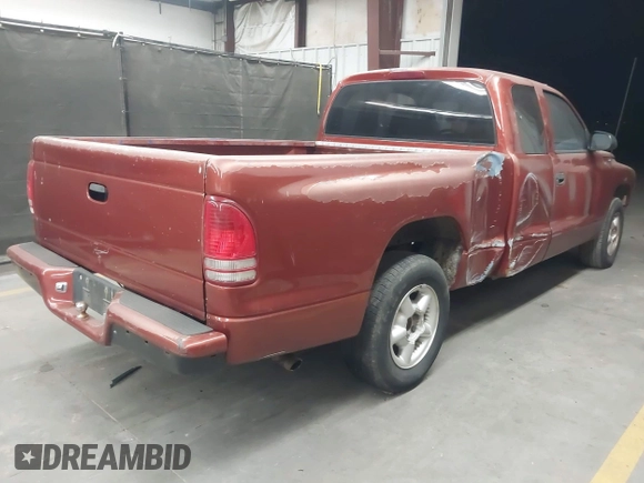1999 Dodge Dakota SLT z VIN 1B7GL22XXXS240005, wystawiony jako IAAI lot #42269211 z przebiegiem 218 163 mil mil oraz . Historia ofert i sprzedaży dostępna na DreamBid. Obrazek 4.