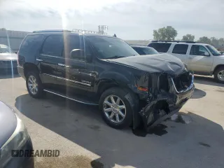2014 GMC Yukon Denali with VIN 1GKS2EEF6ER137805, listed as a Copart auction lot 69835144 with 167,244 mi miles and Salvage Title. Bid and sale history available at carsss.com. Image 4.