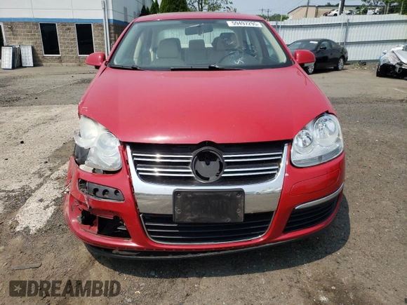 2010 Volkswagen Jetta SE with VIN 3VWRZ7AJ4AM059304, listed as a Copart auction lot 59497295 with 114,957 mi miles and Salvage title. Bid and sale history available at DreamBid. Image 5.