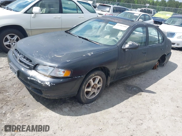 1999 Nissan Altima XE with VIN 1N4DL01DXXC193735, listed as a IAAI auction lot 41982408 with 153,008 mi miles. Bid and sale history available at carsss.com. Image 2.