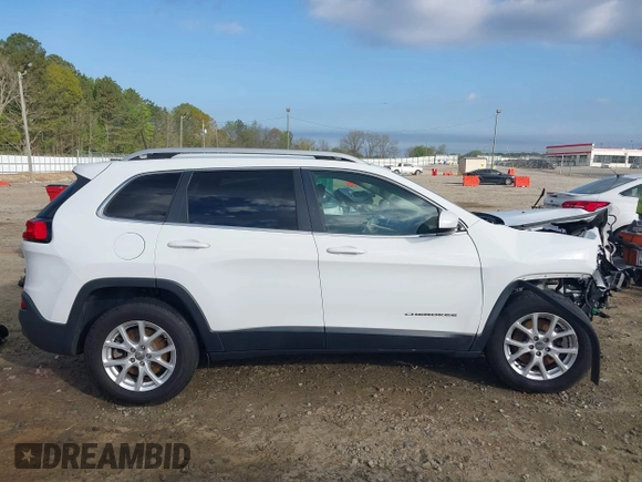 2016 Jeep Cherokee Latitude with VIN 1C4PJMCS5GW148829, listed as a IAAI auction lot 41964335 with 99,741 mi miles. Bid and sale history available at carsss.com. Image 13.
