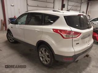 2014 Ford Escape Titanium with VIN 1FMCU9J9XEUE26857, listed as a IAAI auction lot 41552186 with 142,045 mi miles. Bid and sale history available at carsss.com. Image 3.