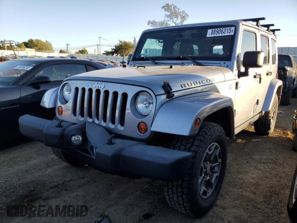 2013 Jeep Wrangler Unlimited Rubicon with VIN 1C4BJWFGXDL556365, listed as a Copart auction lot 88906315 with 113,880 mi miles and Salvage Title. Bid and sale history available at carsss.com. Image 1.