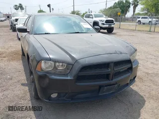 2014 Dodge Charger SXT with VIN 2C3CDXHG3EH122158, listed as a IAAI auction lot 41861010 with 122,842 mi miles. Bid and sale history available at carsss.com. Image 1.