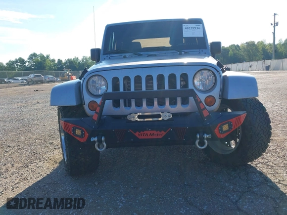 2016 Jeep Wrangler Sahara z VIN 1C4AJWBGXGL120329, wystawiony jako IAAI lot #40239916 z przebiegiem 96 731 mil mil oraz . Historia ofert i sprzedaży dostępna na DreamBid. Obrazek 12.