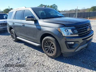 2021 Ford Expedition XLT z VIN 1FMJU1HT8MEA75501, wystawiony jako IAAI lot #41212610 z przebiegiem 32 322 mil mil oraz . Historia ofert i sprzedaży dostępna na DreamBid. Obrazek 1.