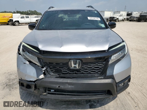 2021 Honda Passport Touring с VIN 5FNYF7H96MB005515, выставлен на аукционе Copart как лот 68536794 с пробегом 30 043 миль миль и Списание • Salvage title. История ставок и продаж доступна на DreamBid. Изображение 5.