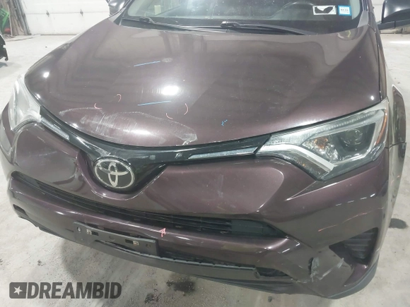 2018 Toyota RAV4 LE with VIN 2T3BFREV0JW759714, listed as a IAAI auction lot 41823084 with 119,909 mi miles and . Bid and sale history available at DreamBid. Image 19.