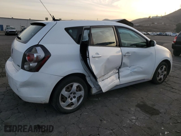 2009 Pontiac Vibe w/1SA with VIN 5Y2SL67809Z439030, listed as a Copart auction lot 87419194 with 104,518 mi miles and Salvage Title. Bid and sale history available at carsss.com. Image 3.