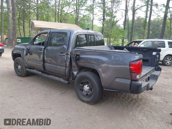 2022 Toyota Tacoma SR with VIN 3TYAX5GN1NT042099, listed as a IAAI auction lot 42081791 with 38,621 mi miles and . Bid and sale history available at DreamBid. Image 3.