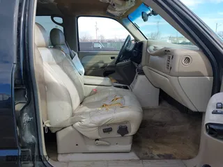 2001 Chevrolet Tahoe LS with VIN 1GNEK13T41R219642, listed as a IAAI auction lot 41655081 with 243,737 mi miles. Bid and sale history available at carsss.com. Image 5.