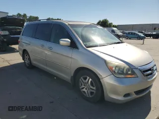 2005 Honda Odyssey EX-L z VIN 5FNRL386X5B407129, wystawiony jako Copart lot #56366655 z przebiegiem 181 893 mil mil oraz Szkoda całkowita • Salvage title. Historia ofert i sprzedaży dostępna na DreamBid. Obrazek 4.