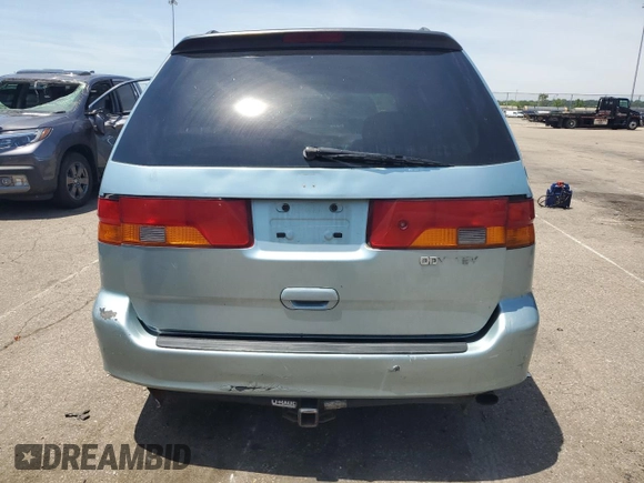 2004 Honda Odyssey EX-L with VIN 5FNRL18014B015462, listed as a Copart auction lot 62834665 with 323,817 mi miles and Salvage title. Bid and sale history available at DreamBid. Image 6.