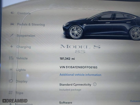 2013 Tesla Model S with VIN 5YJSA1DN9DFP06165, listed as a IAAI auction lot 40920844 with 181,342 mi miles. Bid and sale history available at carsss.com. Image 7.