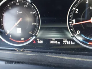 2015 BMW 6 Series 640i xDrive with VIN WBA6B8C50FD453317, listed as a IAAI auction lot 41635430 with 77,811 mi miles and . Bid and sale history available at DreamBid. Image 7.