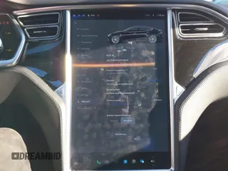 2014 Tesla Model S 60 with VIN 5YJSA1H1XEFP36008, listed as a IAAI auction lot 41287240 with 48,171 mi miles and . Bid and sale history available at DreamBid. Image 19.